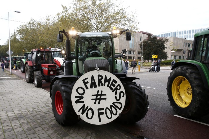 Dutch farmers protest with their tractors on their way to the the provincial government office of Overijssel in Zwolle