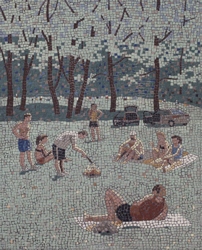 In a ceramic mosaic in the tones of blue, brown and red, a group of people dressed in summery clothes sits around a bonfire lit in a park
