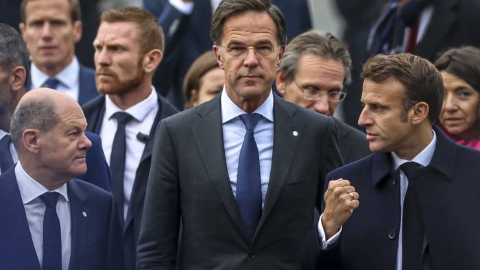 From left, German chancellor Olaf Scholz, Mark Rutte, the Dutch prime minister, and President Emmanuel Macron of France