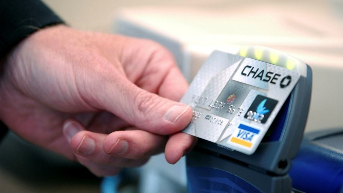The new Chase Bank credit card with ‘blink’ technology is displayed during a press conference at an Arby’s restaurant June 8 2005 in Denver, Colorado