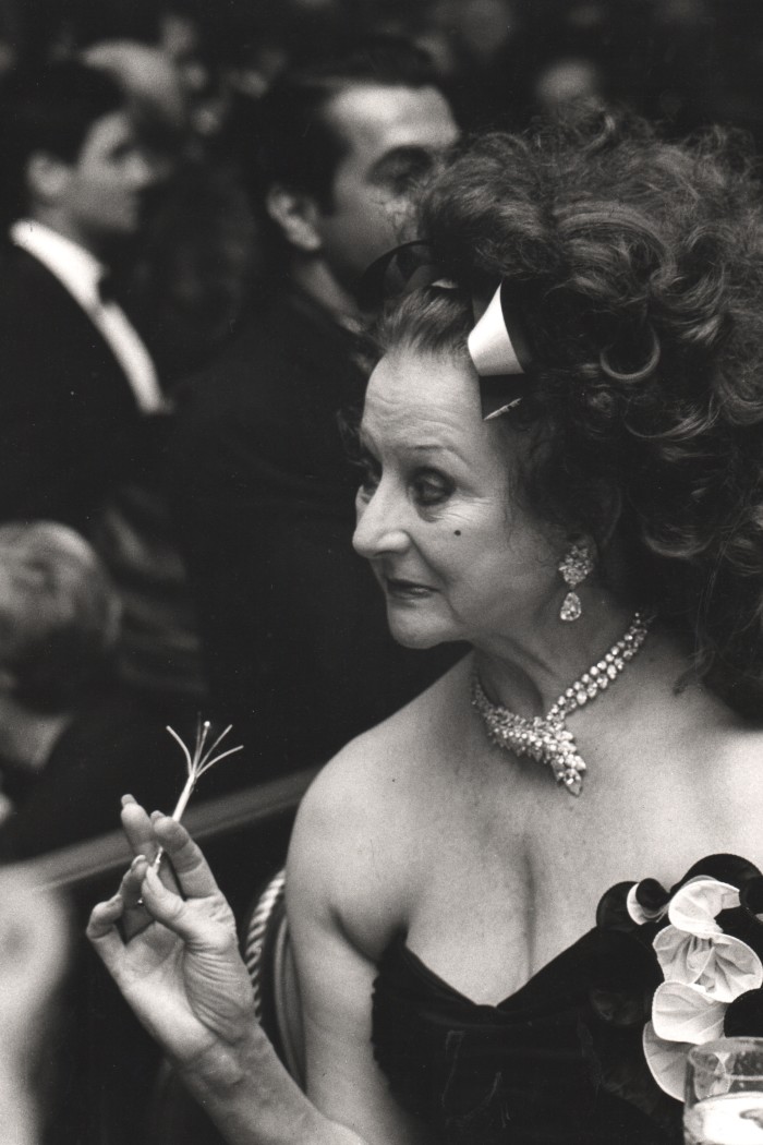 Martha Reed with a champagne swizzle stick at the Spanish Institute’s Gold Medal Gala, The Pierre, 1989