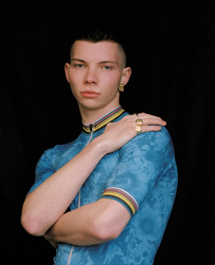 Student Tom Banks, 19, wears Paul Smith cycling jersey, £155. Bunney gold rings, all POA. Fendi vintage gold earring, stylist’s own