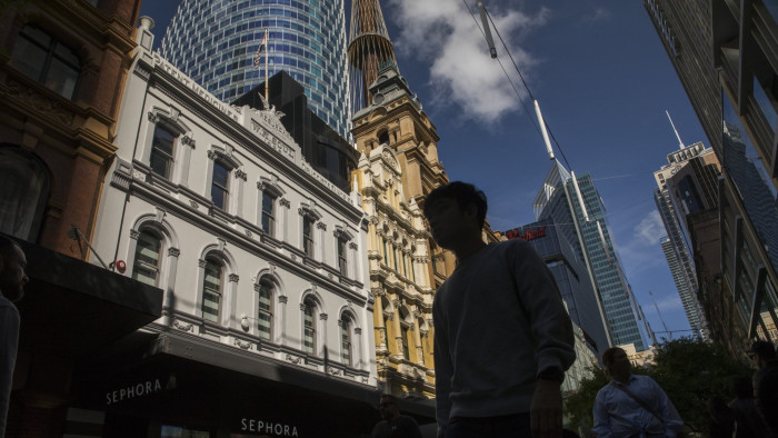 People walk through Pitt Street Mall in Sydney
