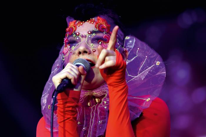 Björk performs in an embroidered headdress by James Merry, Berlin, 2015