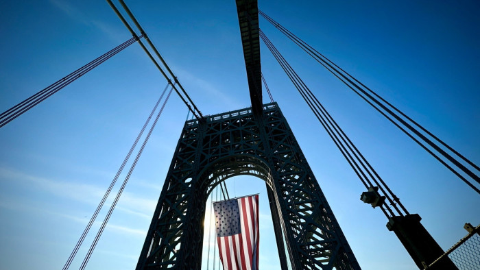 The largest free-flying US flag in the world hangs from the western span of the George Washington Bridge over the Hudson River between New Jersey and New York City