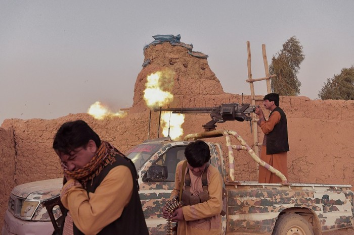 Anti-Taliban militia fighting on the outskirts of Lashkar Gah in March