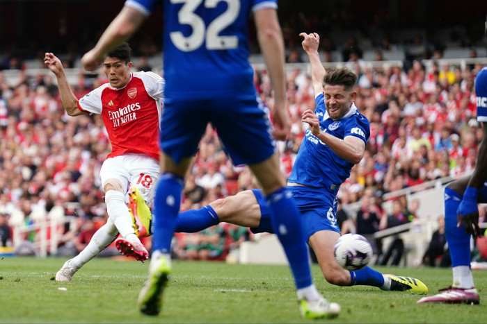 Arsenal’s Takehiro Tomiyasu scores his side’s first goal against Everton at the Emirates Stadium