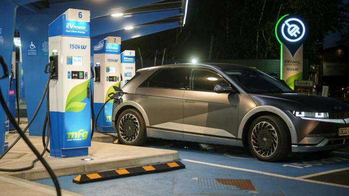 A Hyundai Ioniq battery electric vehicle charges at a Motor Fuel Group EV Power forecourt on April 21 2022 in Manchester, England