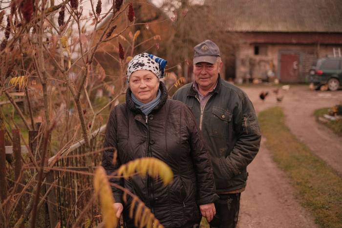 Vida and husband Petras stand by their farm in the Suwałki Gap 