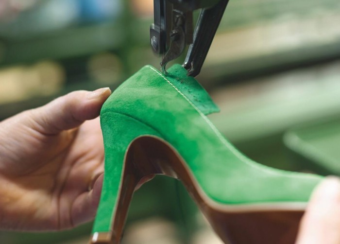 A high heel being restored at KPA Shoe Repair and Services in Northwood