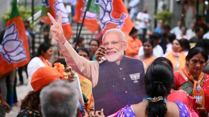 Supporters of Narendra Modi, India’s prime minister and leader of Bharatiya Janata party, celebrate vote-counting results in Bengaluru