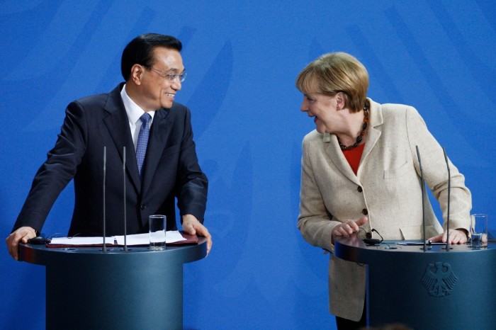 Premier Li Keqiang, left, and Germany’s chancellor Angela Merkel at a press conference in Berlin in 2014
