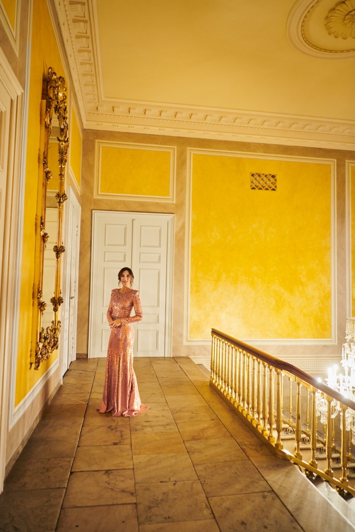 Crown Princess Mary at the top of a staircase in the palace – one of four that form the Amalienborg royal complex