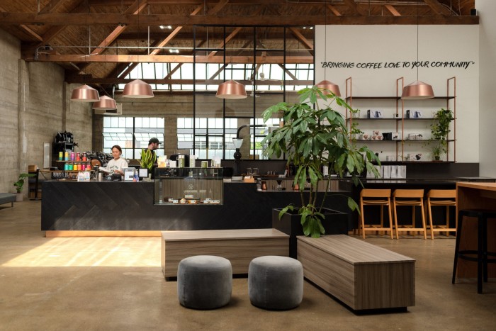 The counter and seating in the headquarters of Pallet coffee