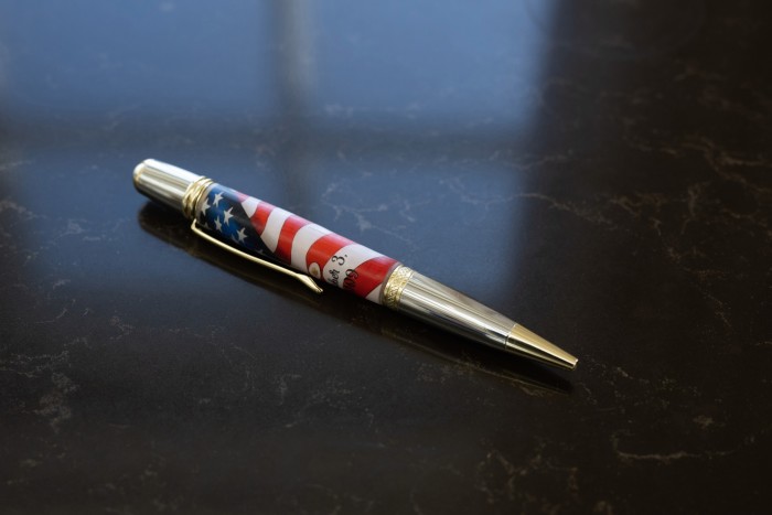 A tribute pen with earth from Combat Outpost Keating in Afghanistan, which Tapper wrote about, and dirt from the set in Bulgaria of the book’s movie adaptation