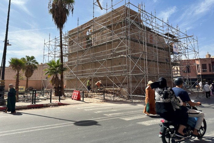 Scaffolding swathes a building in Marrakech, as rebuilding takes place following the September 8 earthquake