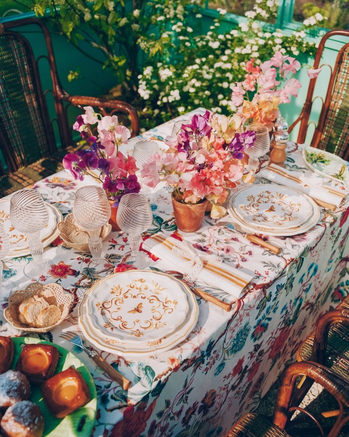 Dior Maison Bees – Earthenware and Honey dinner plates, £140 each, dessert plates, £110 each, Olive Tree knives and forks, £110 each, Baroque Murano water glass, £100, and wine glasses, £85 each