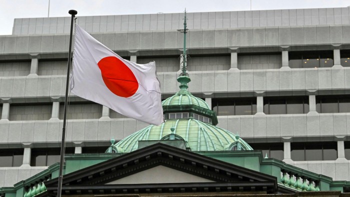A Japanese flag over the Bank of Japan 