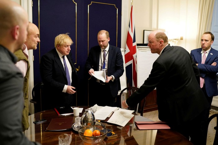 UK prime minister Boris Johnson (third from left) at a Downing Street meeting on February 28