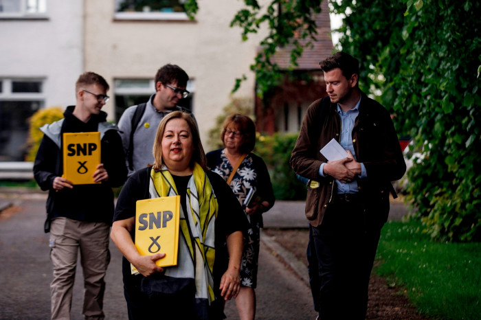 Kirsten Oswald of the SNP and her team canvasing in Neilston, near Glasgow