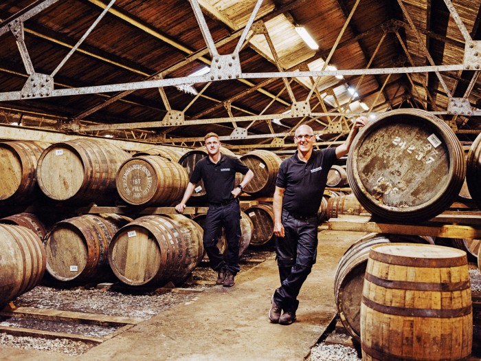 Senior operator Alan Duff Sr (right) with his son Alan Duff Jr, one of Glenmorangie distillery’s warehouse team leaders