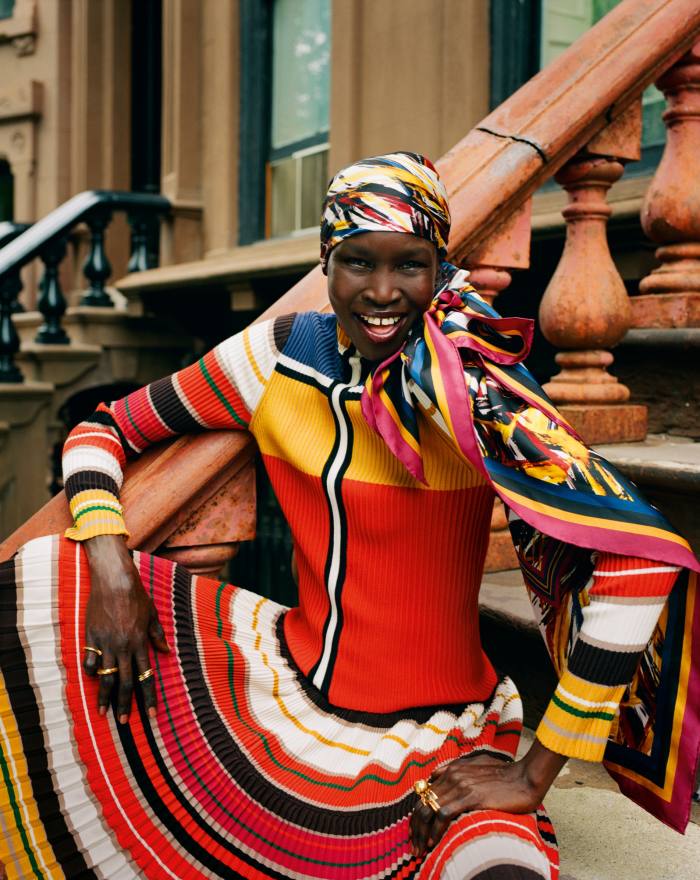 Weekend Max Mara: A.W.ORLD by Alek Wek viscose top, £230, viscose skirt, £350, and silk twill headscarf, £115. Bottega Veneta gold and silver rings, £685 each. Alighieri gold-plated silver The Moon Shine ring, £395, The Trembling Bough ring, £225, The Better Craftsman ring, £395, and The Beginning of the Plait ring, £250