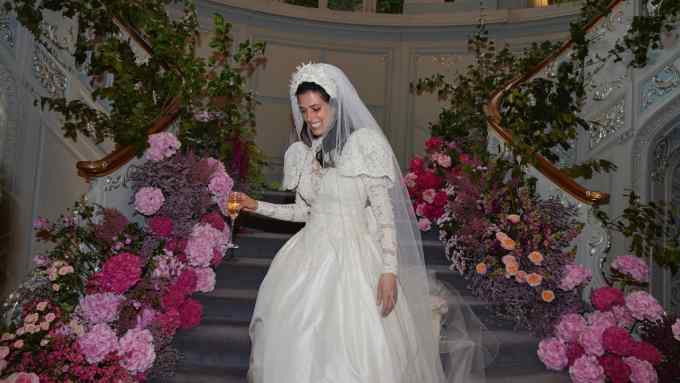 Producer Sylvia Farago wears her upcycled 1990s wedding dress, with a crown embellished for her by Simone Rocha