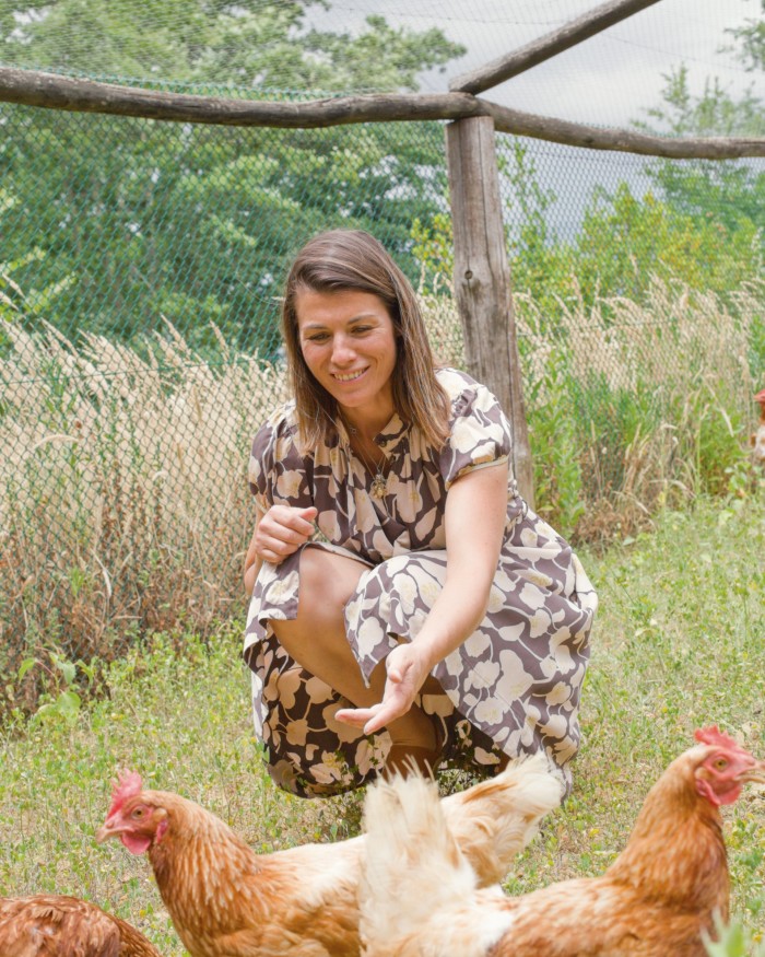 Vittoria Ferragamo at the chicken enclosure: the estate has two breeds of Tuscan hen