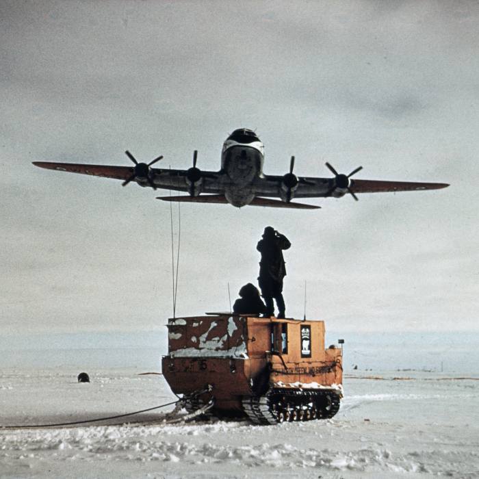 A Weasel tracked vehicle and a Handley Page Hastings aircraft on the expedition