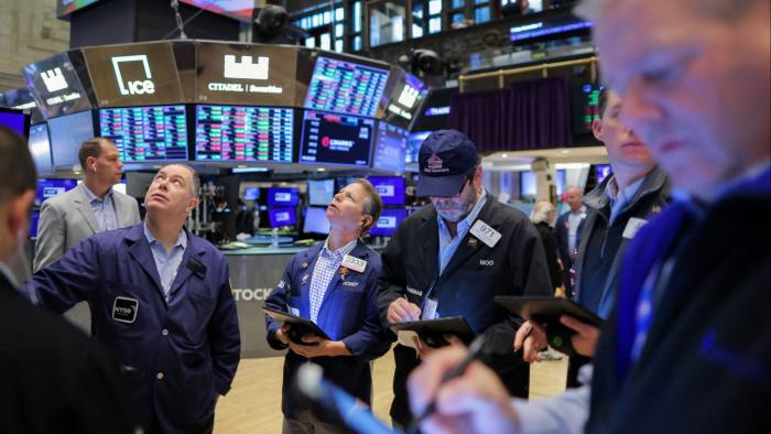 Traders working on the floor at the New York Stock Exchange