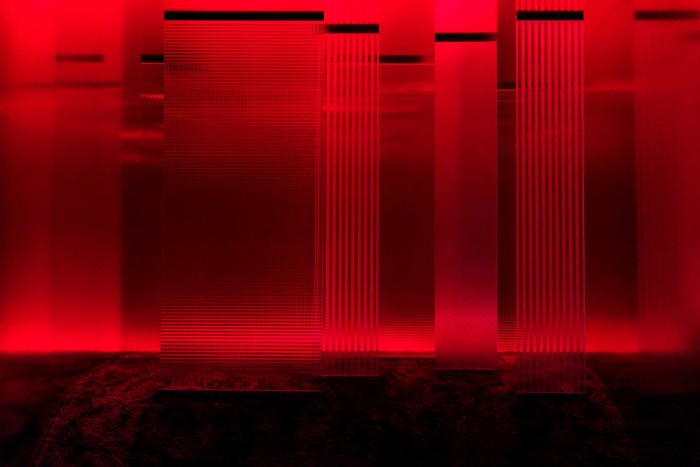 A reconstruction of the red-neon Utopie corridor that Vigo designed with Lucio Fontana for the 1964 Milan Triennale
