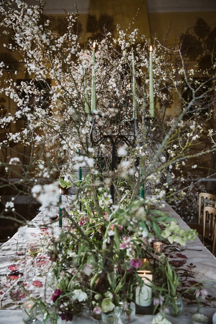 Blackthorn blossom, hellebores and snake’s head fritillary decorated table by Tattie Rose Studio for a lunch at the Temple, West Wycombe Park 