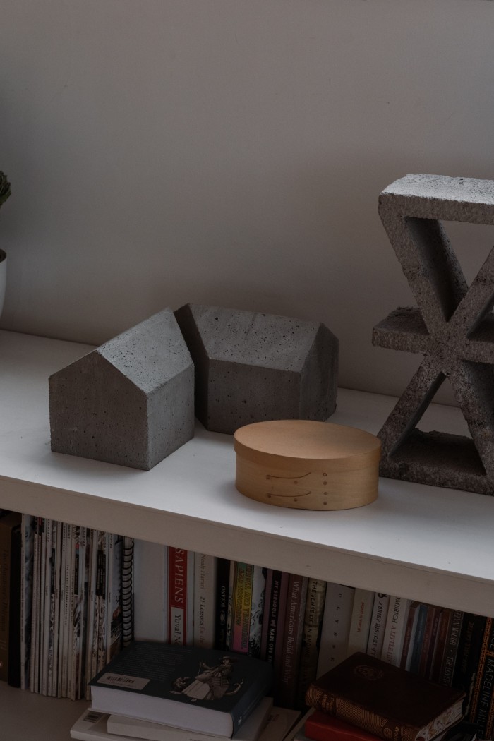A concrete model, a wooden box from Japan, and the celosia used for La Tallera Museum
