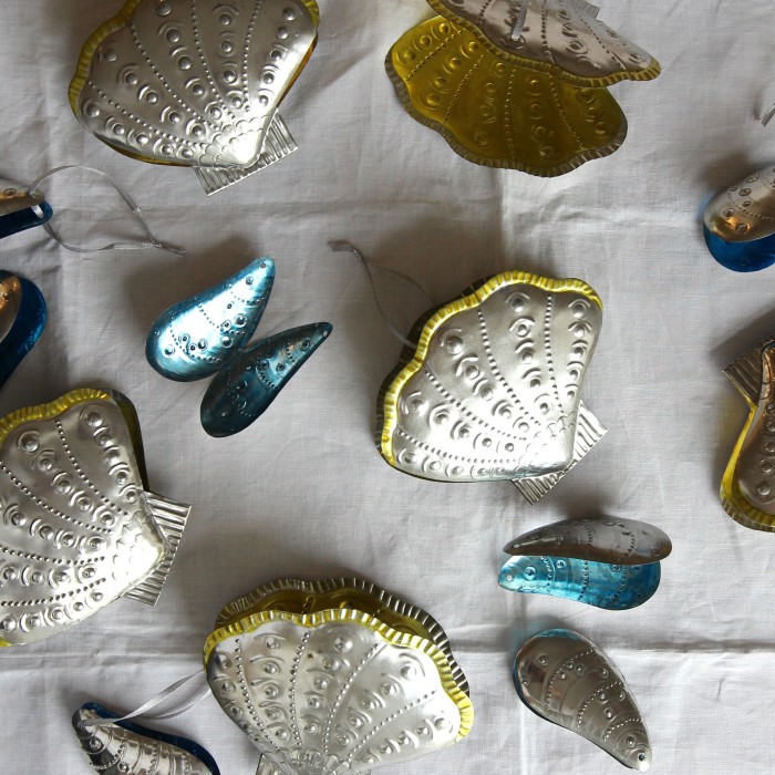 Selection of tin scallop shell (£42 each) and mussel shell (£22 each) tree decorations at The Shop Floor Project