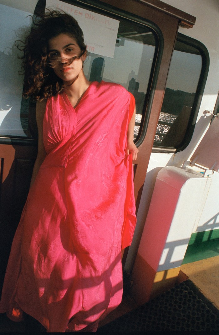 Student and model Rozerin Deniz, 19, wears Balenciaga jacquard asymmetric dress, €3,200