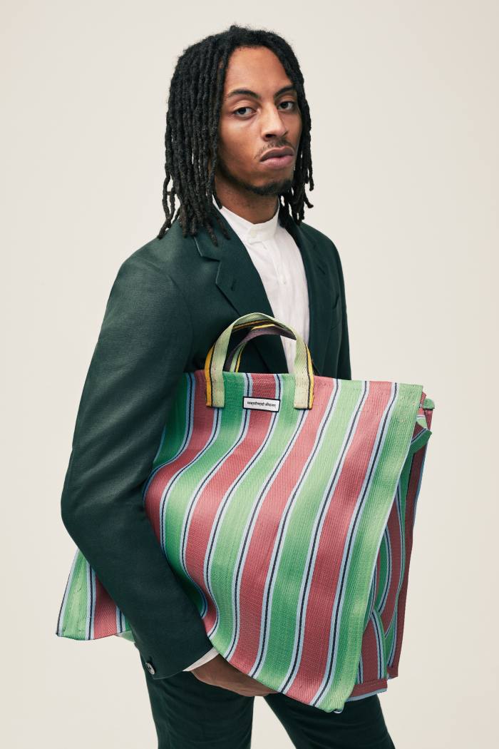 Kota market bag, £45, and Chela linen jacket in Nairobi green, £295