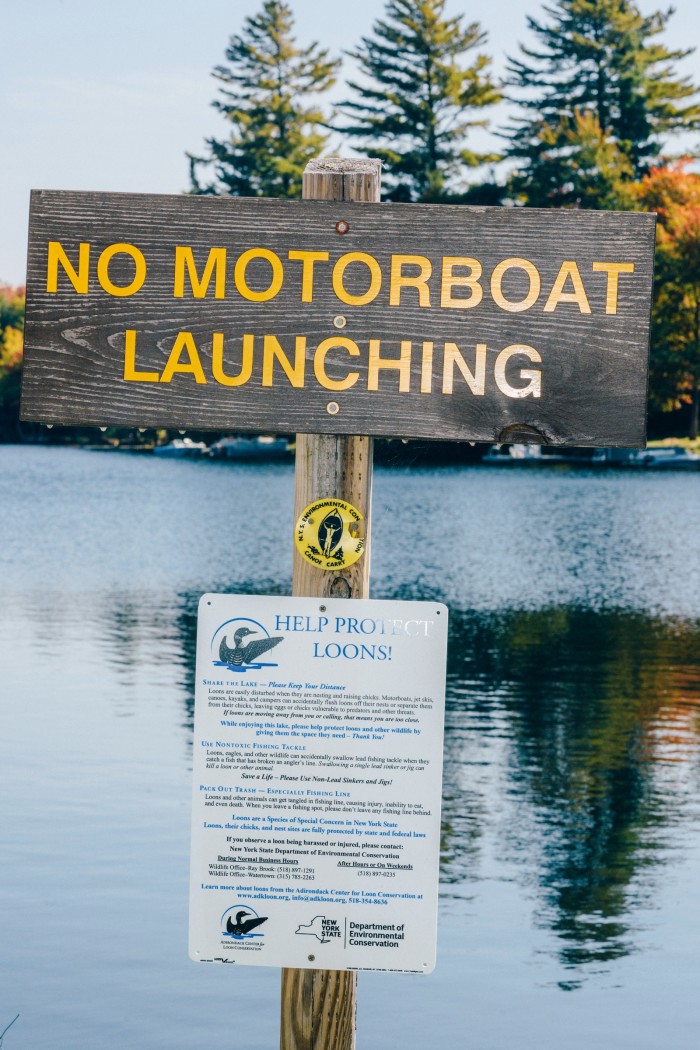 A sign beside the canoe launch on Sixth Lake