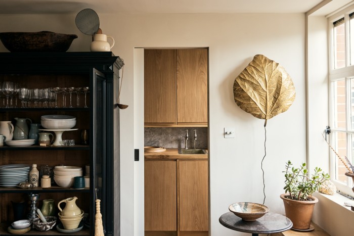 The kitchen, with cupboards designed by Ellis and a pippy oak worktop