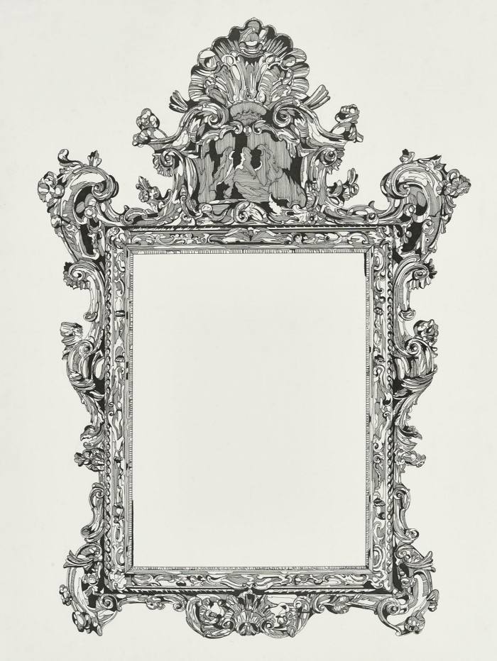 The ornate mirror has a decorative frame