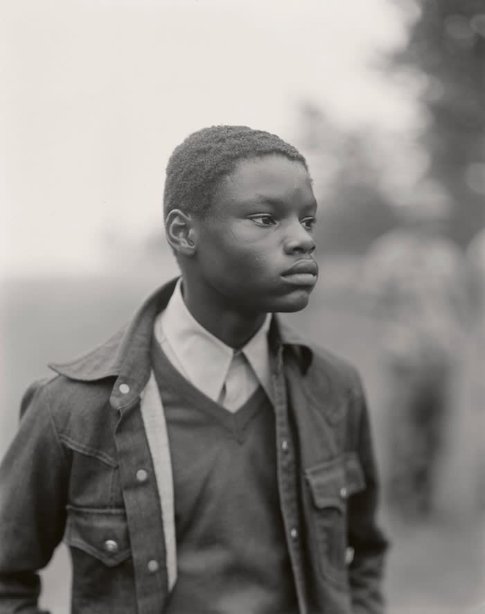 Young man at the Vietnam Veterans Memorial