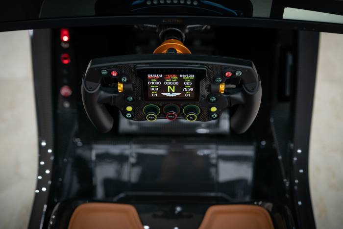 The F1-style steering wheel has paddle-shift gears