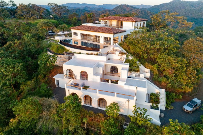 A modern, hillside residence on multiple levels