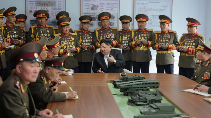 North Korea’s leader Kim Jong Un surrounded by senior military personnel