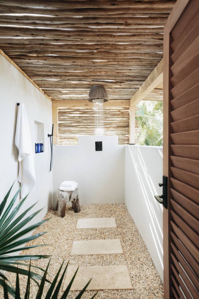 A treehouse shower room at Lovango Resort + Beach Club
