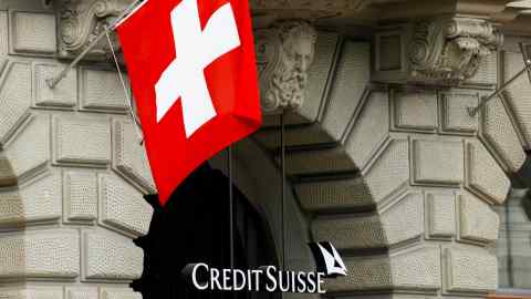 Flag outside Credit Suisse headquarters