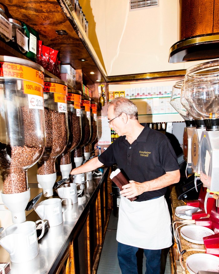 The café’s co-owner, Stefano Maga, grinding coffee