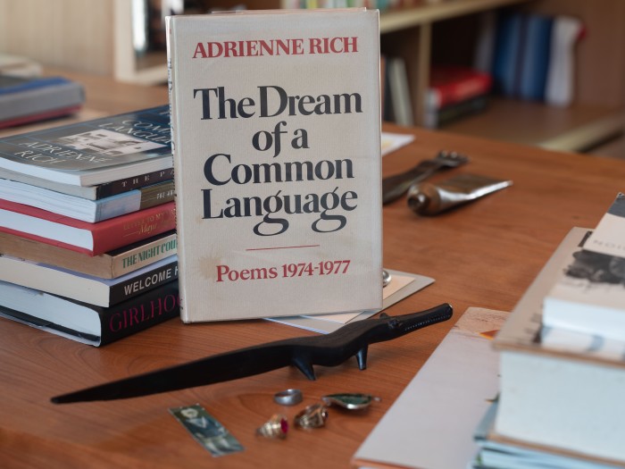 A poetry collection by Adrienne Rich on Liz Lambert’s desk