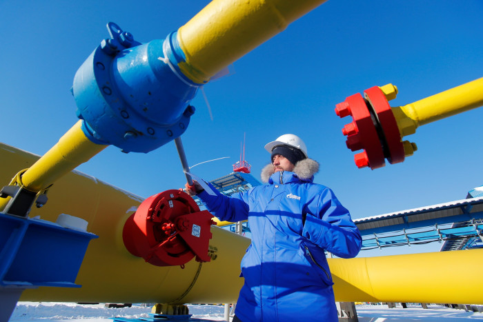 A worker at Gazprom’s Power Of Siberia gas pipeline