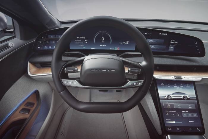 The floating dashboard and wraparound windscreen inside the Air