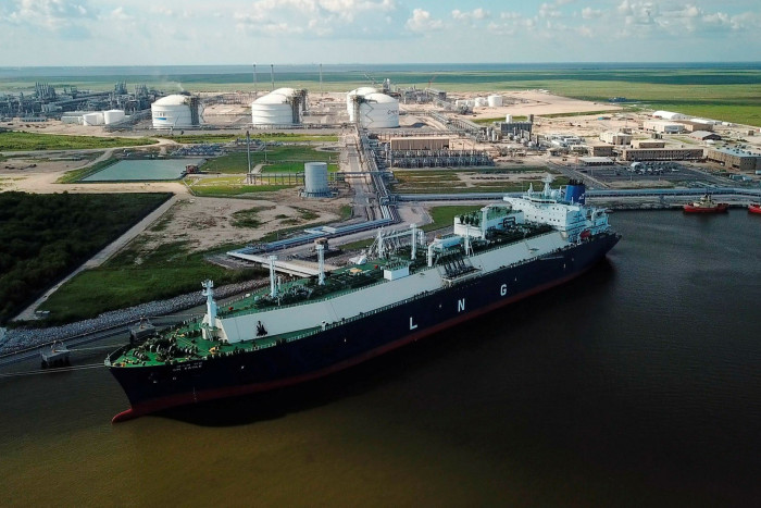 An LNG carrier ship docked at Cheniere’s Sabine Pass Terminal in Louisiana